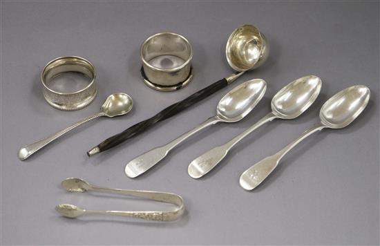 A group of small silver including two serviette rings, salt spoon, a pair of sugar tongs, a silver toddy ladle and three teaspoons (8)